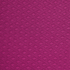 Deep pink multilayer fiber fabric texture. Close up, top view.