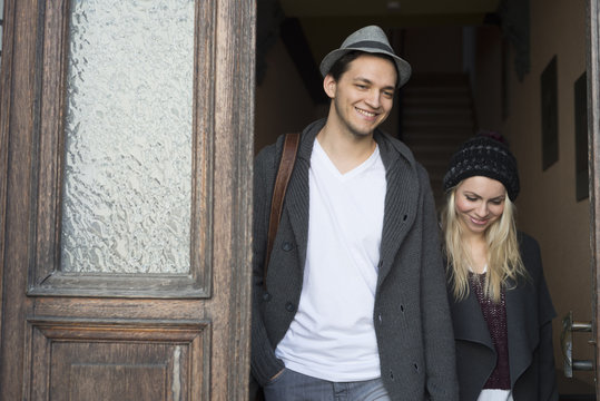 Couple in love leaving house