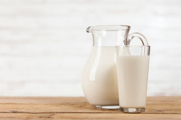 Milk jar on wooden table