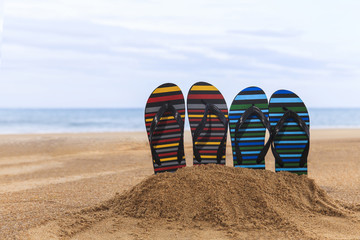 Flip flops on the sandy beach