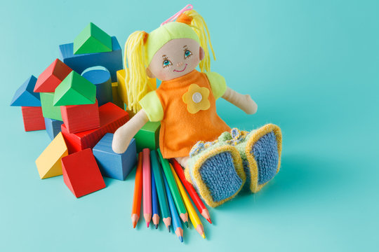 Doll with colored pencils