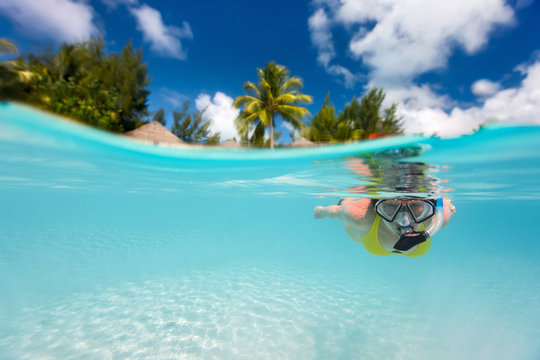 Woman swimming underwater