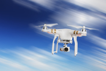 Drone with high resolution camera flying.
