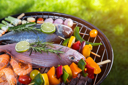 Barbecue grill with sea fishes.