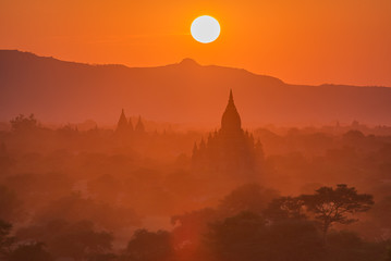 group of ancient pagodas at the scenic sunrise at bagan myanmar