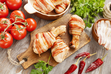 Chicken leg wrapped in bacon