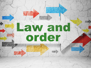 Law concept: arrow with Law And Order on grunge wall background