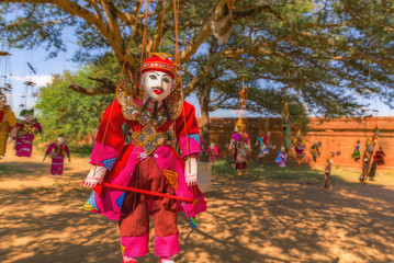 Traditional handicraft puppets are sold in a market in Bagan, Myanmar