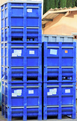 Square blue containers outdoors