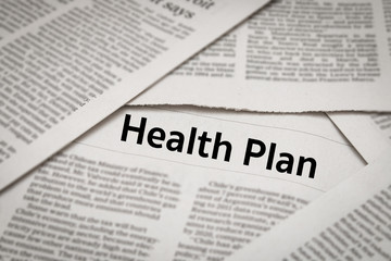 health plan headline on newspaper