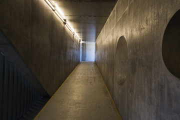 Obraz premium Empty concrete tunnel with neon lights