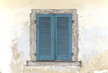 Fototapeta na wymiar Blue old wooden window shutters
