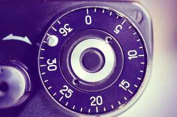 Fragment of old film camera. Top view of shutter button and the frame counter. Close up view....