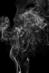 Abstract gray smoke from the incense sticks.