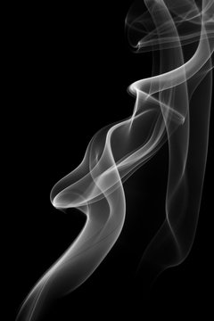 Abstract gray smoke from the incense sticks.