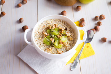 oatmeal with nuts and fruits for breakfast