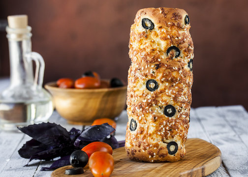 Hungarian a round loaf with olives and cheese