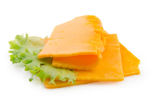 Cheddar. Slices of cheese isolated on white background with clipping path