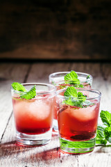 Alcoholic cocktail with white rum Bacardi, Campari, vermouth, mi