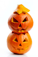 Two orange halloween pumpkins Jack O Lanterns