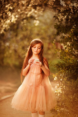 beautiful girl in the park in spring