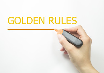 hand writing golden rules. business concept