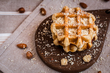 Waffles. Belgian sugar waffles with grated nuts