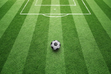 Conceptual soccer free kick ball background. Soccer ball on sunny football field ground.  © robsonphoto