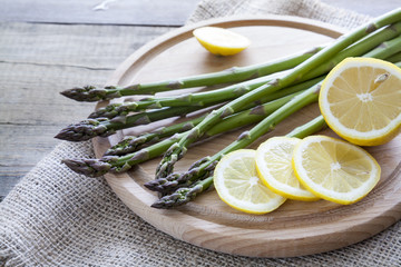 Bunch of fresh green asparagus spears on the table