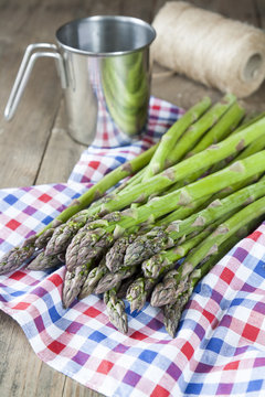 Bunch of fresh green asparagus spears on the table