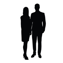 Man and woman in formal wear standing side by side. 