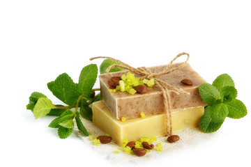 Natural handmade soap with fragrant herbs and coffee beans, isol