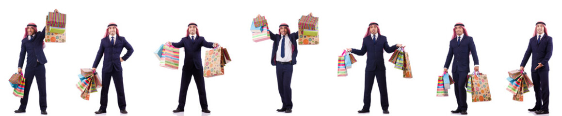 Arab man with shopping gifts on white