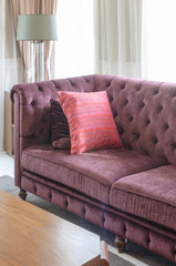 red luxury sofa style with pillows in classic living room