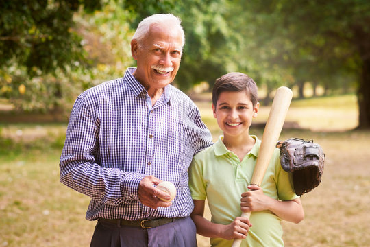 Portrait Happy Family Grandfather And Boy Playing Baseball