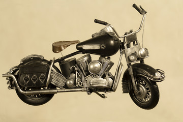 souvenir vintage motorcycle on a gray background