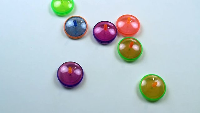 Slow Motion At End Spinning Toy Tops Colorful Plastic
