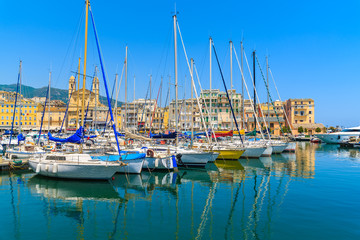 Fototapeta na wymiar Sailing boats mooring in Bastia port on sunny summer day, Corsica island, France