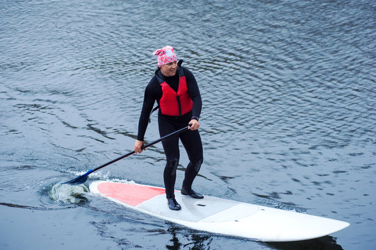 athletic man stand up paddle board SUP06