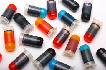 Many bottles with different color printer ink