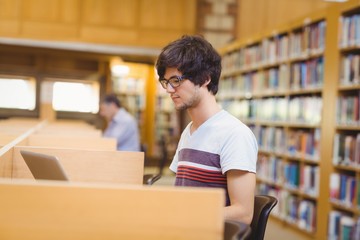 Young student using his laptop