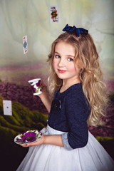 Little girl as Alice in Wonderland