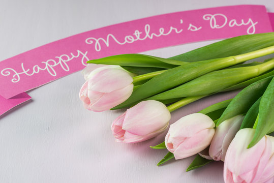 Greetings for Mothers Day with tulips.