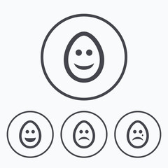 Eggs happy and sad faces signs. Easter icons.