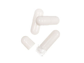 White medicine pills with drug isolated over white