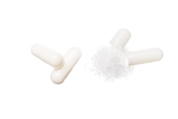White medicine pills with drug isolated over white