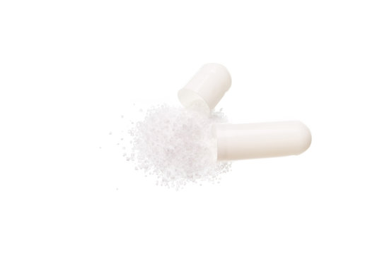 White medicine pills with drug isolated over white