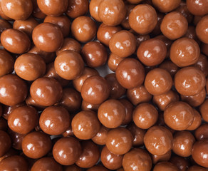 Chocolate candies  background.  Closeup brown chocolate candy ba