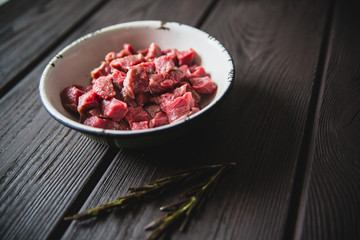 minced meat on wooden table