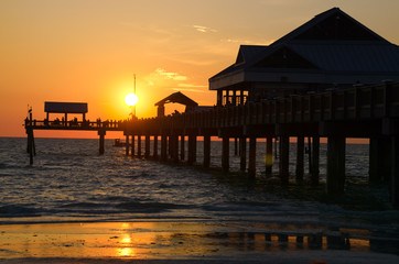 Colorful coastal sunset at the iconic Pier 60 in Clearwater Beach, Florida.